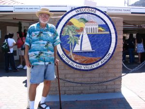 Down LA River Catalina: John Varley next to Welcome sign