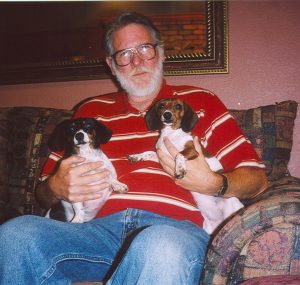 John Varley with wiener dogs